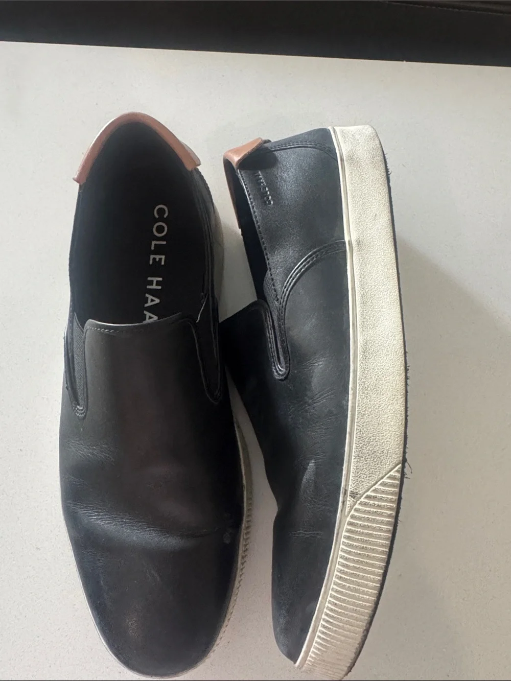 Cole Haan Black Leather Slip-On Sneakers with Brown Heel Tab